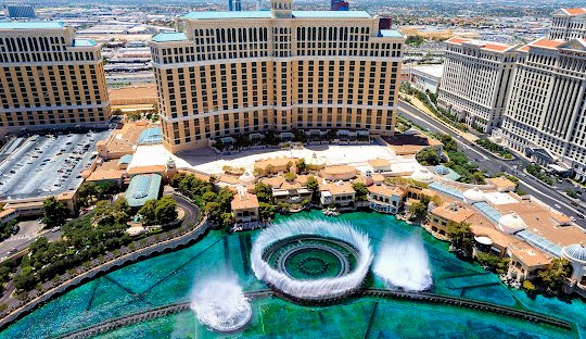 View from Paris Casino’s Eiffel Tower Replica (500’) looking down to the Bellagio Casino and their water show.